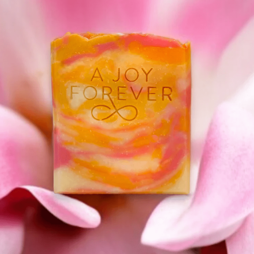 Pink Magnolia vegan soap; plant-based bar infused with delicate magnolia fragrance, providing gentle cleansing and moisturizing while using eco-friendly, cruelty-free ingredients.