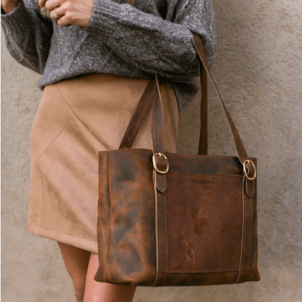 Regina Tote is a stylish and functional handbag for everyday use, featuring durable construction and a roomy interior for essentials. Mocha