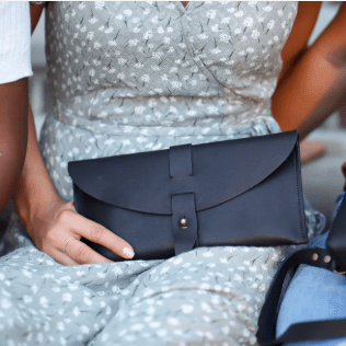 5th Avenue Full-Grain Leather Envelope Clutch, sleek and sophisticated, perfect for carrying essentials in style for day or evening occasions. Black