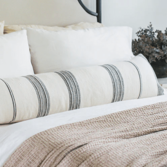 Ayden lumbar pillow; soft, rectangular accent pillow designed for sofas, chairs, or beds, offering comfort and style with a handcrafted, home décor-friendly design.