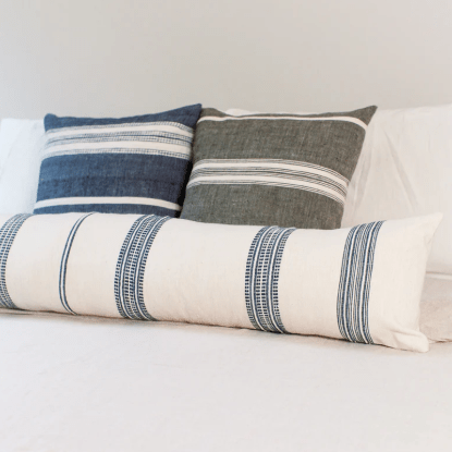 Ayden lumbar pillow; soft, rectangular accent pillow designed for sofas, chairs, or beds, offering comfort and style with a handcrafted, home décor-friendly design.