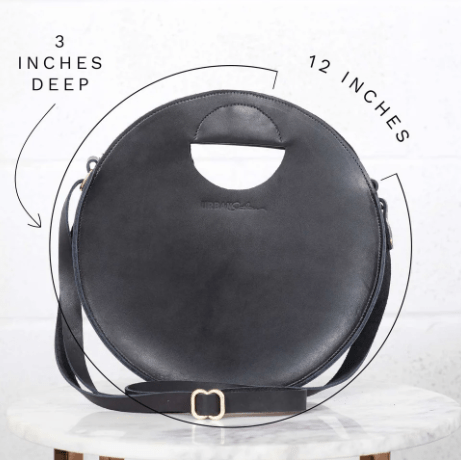 Britt Full-Grain Leather Circle Crossbody Bag, handcrafted design with adjustable strap, ideal for hands-free everyday style and versatile outfits. Black