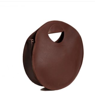 Britt Full-Grain Leather Circle Crossbody Bag, handcrafted design with adjustable strap, ideal for hands-free everyday style and versatile outfits. Chestnut Brown