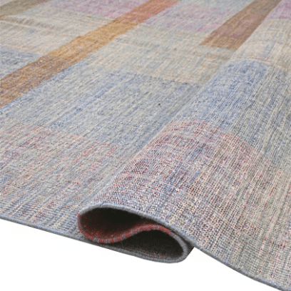 Jalal Kelim Arcobaleno handwoven wool flatweave rug, crafted with vibrant geometric patterns and a durable low-profile design, ideal for layering or modern interiors.
