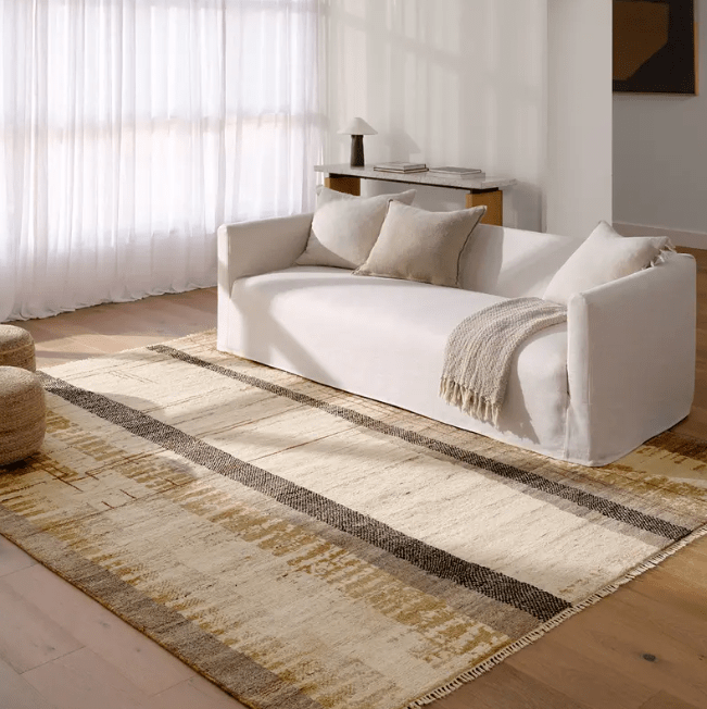 Kazben Nazani hand-knotted 100% wool rug with Moroccan-inspired texture; artisan-crafted area rug offering plush comfort, organic patterning, and warm neutral tones for modern interiors.