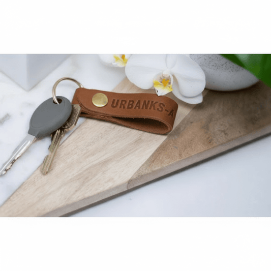 Handcrafted leather key fob is a durable and stylish accessory.