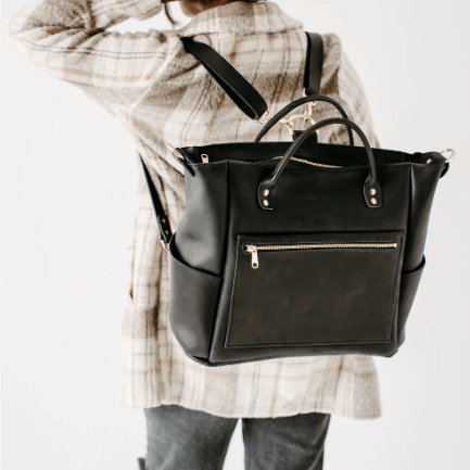 Legacy Backpack Tote is a versatile and stylish bag designed for everyday use, featuring comfortable straps and durable construction. Black