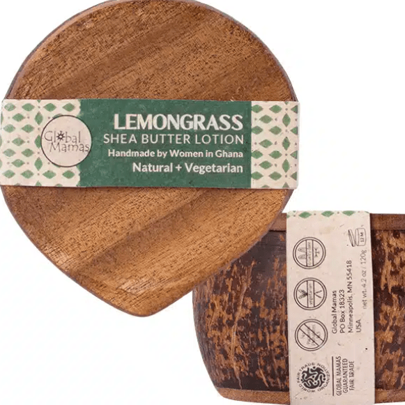 Lemongrass shea butter in a repurposed coconut shell container, handmade in Ghana.