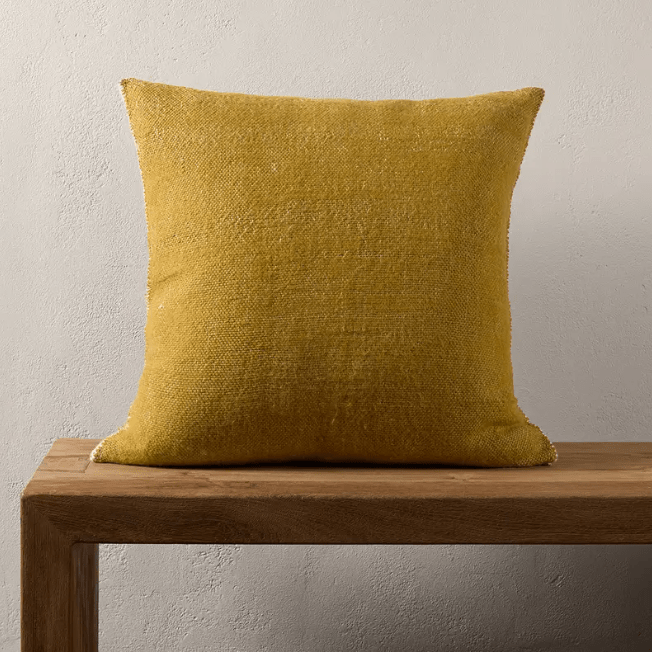 Margosa Mila 100% wool textured pillow in stonewashed finish; handcrafted accent pillow for sofas, chairs, or beds, adding cozy texture and artisan detail to home décor. Sulfur Green Down feather