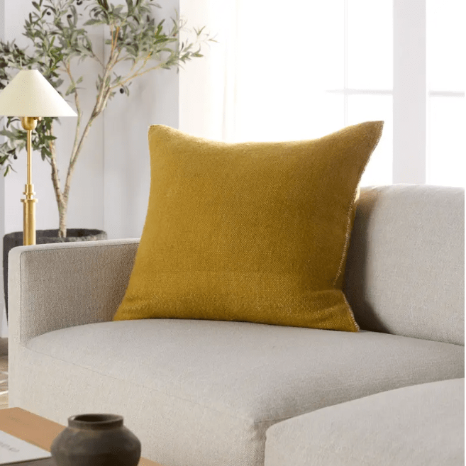 Margosa Mila 100% wool textured pillow in stonewashed finish; handcrafted accent pillow for sofas, chairs, or beds, adding cozy texture and artisan detail to home décor. Sulfur Green Polyester