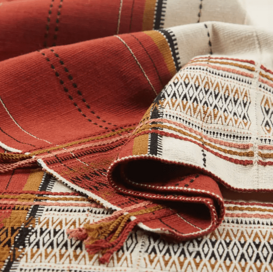 Nagaland Angami handcrafted cotton throw blanket; artisan-made textile featuring traditional weaving, soft texture, and cultural patterning—perfect for sofas, chairs, or beds.