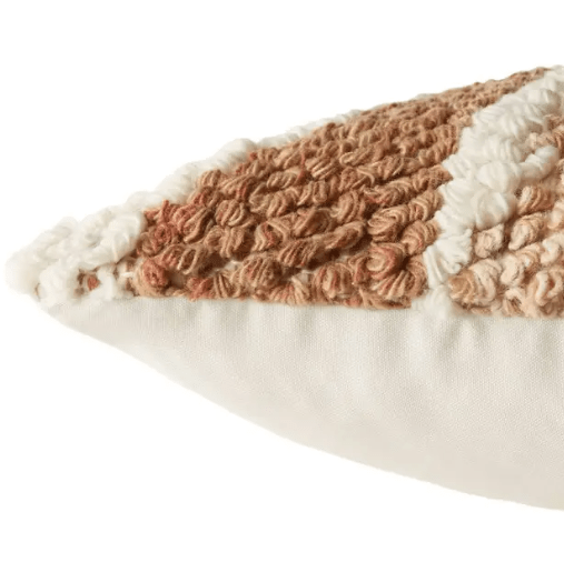 Nazka ‘Hasani’ handcrafted indoor/outdoor pillow featuring abstract bouclé texture, versatile accent for living spaces, patios, or decks, adding contemporary style and tactile interest. Corner