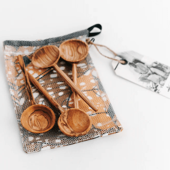 Set of 4 hand-carved olive wood coffee spoons with fabric pouch, handcrafted in Kenya.