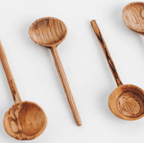 Set of 4 hand-carved olive wood coffee spoons with fabric pouch, handcrafted in Kenya.