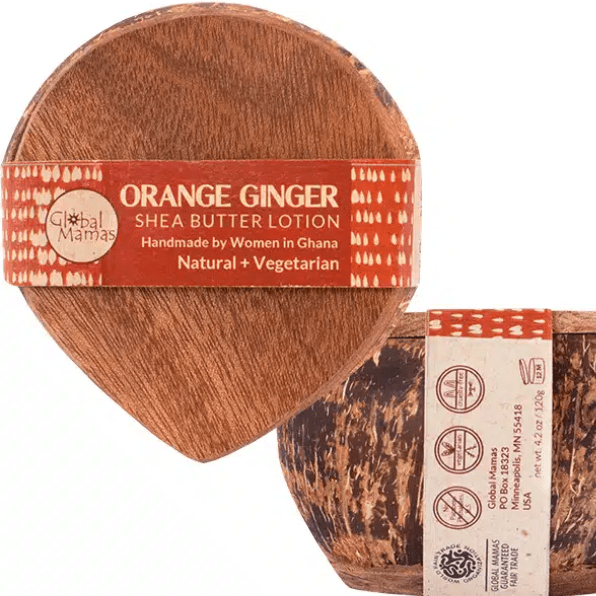 Orange Ginger shea butter in a repurposed coconut shell container, handmade in Ghana.