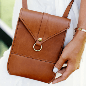 Postal crossbody handbag, stylish and functional with an adjustable strap, ideal for daily use and hands-free convenience. Honey