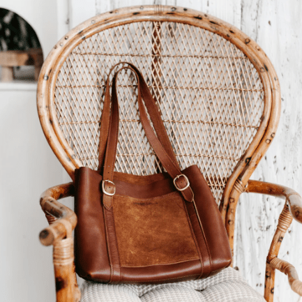 Regina Tote is a stylish and functional handbag for everyday use, featuring durable construction and a roomy interior for essentials. Cognac