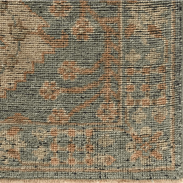 Rhapsody Maeli hand-knotted 100% wool rug in vintage Oushak style; artisan-crafted area rug featuring soft tones, intricate detailing, and timeless appeal for elegant interiors.
