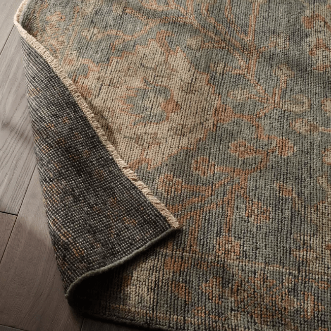 Rhapsody Maeli hand-knotted 100% wool rug in vintage Oushak style; artisan-crafted area rug featuring soft tones, intricate detailing, and timeless appeal for elegant interiors.