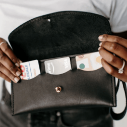 Ruby leather wristlet wallet with secure zip closure, compact design for essentials, versatile accessory for everyday use.