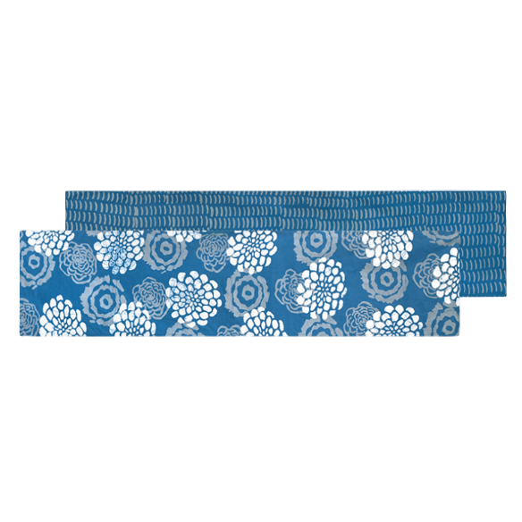 Short organic cotton table runner; reversible and topstitched for durability and style, perfect for dining tables, sideboards, or as an accent piece in home décor. Light blue