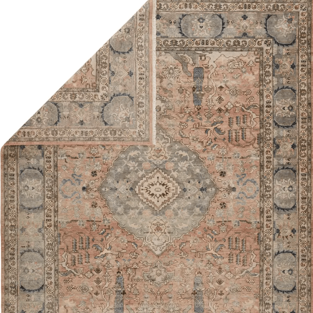 Someplace in Time Collection Pendulum rug, hand-tufted wool and viscose with vintage-inspired pattern, warm neutral tones, ideal for dining rooms or open living spaces. Folded corner view.