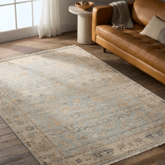 Someplace in Time Resonant hand-knotted 100% wool rug with a timeworn finish; durable, kid- and pet-friendly artisan-crafted area rug adding texture, warmth, and timeless style to living spaces.