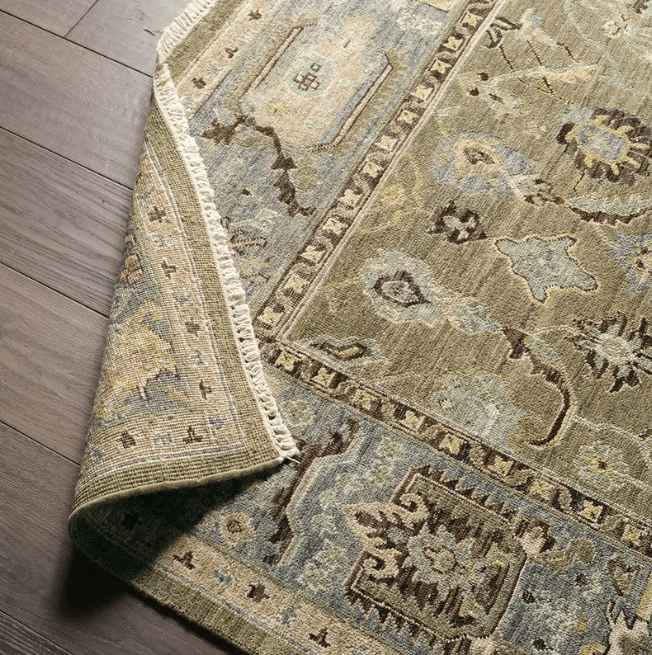 Someplace In Time SPT09 hand-knotted wool rug in neutral tan, beige, and gray tones; traditional-inspired pattern with a timeworn, artisan-crafted look, ideal for living rooms and high-traffic areas.