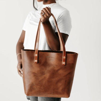 Urban Classic Tote, a versatile and timeless handbag, is crafted for everyday use with durable materials and an elegant design.