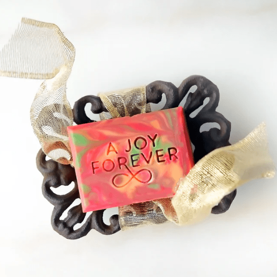 Wrought iron soap dish; durable, hand-forged bathroom accessory designed to keep soap dry and extend its life, adding rustic charm and functional style to any countertop or shower.