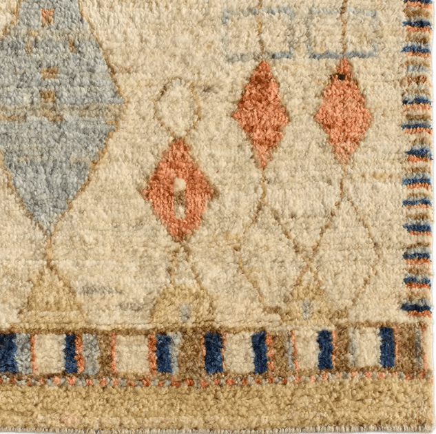 Zaira Tonnara hand-knotted 100% wool rug featuring a modern Moroccan geometric diamond pattern; artisan-crafted area rug offering luxurious texture and timeless design for living spaces.