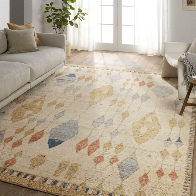 Zaira Tonnara hand-knotted 100% wool rug featuring a modern Moroccan geometric diamond pattern; artisan-crafted area rug offering luxurious texture and timeless design for living spaces.