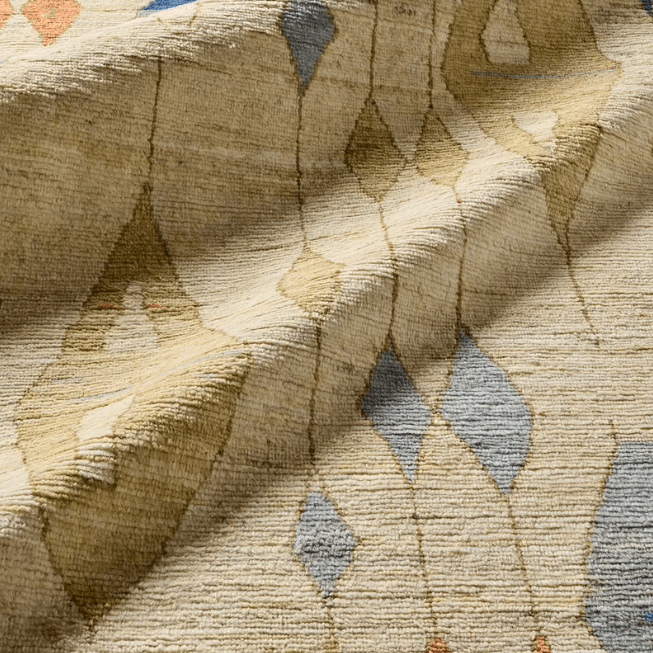 Zaira Tonnara hand-knotted 100% wool rug featuring a modern Moroccan geometric diamond pattern; artisan-crafted area rug offering luxurious texture and timeless design for living spaces.