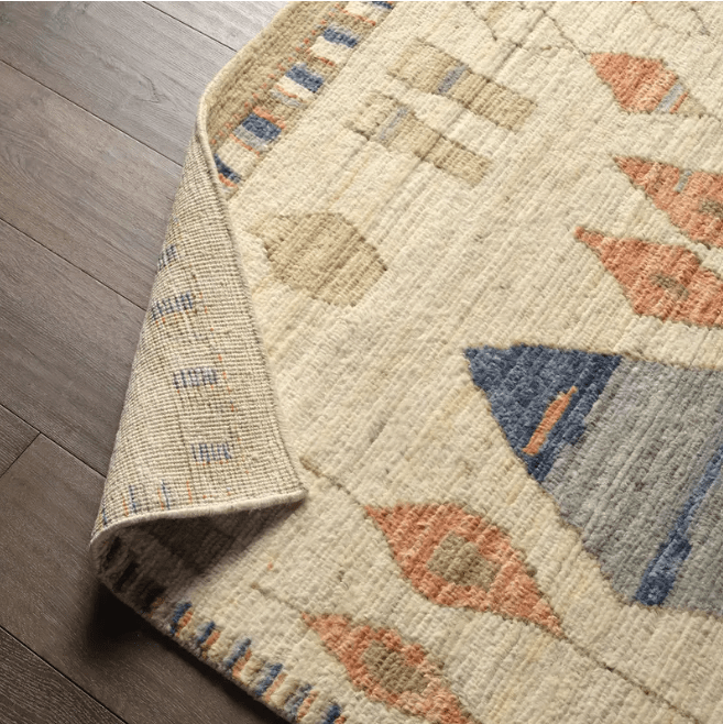 Zaira Tonnara hand-knotted 100% wool rug featuring a modern Moroccan geometric diamond pattern; artisan-crafted area rug offering luxurious texture and timeless design for living spaces